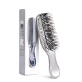 Detail view of silver plated scalp massage hair brush with premium packaging - Standard Size / Silver