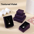 Detail of violet linen textured jewelry boxes with black velvet lining for necklaces - Linen Pattern Violet; 5*8*3cm