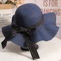 Elegant navy blue straw sun hat featuring a striped bow ribbon for summer beach vacations - M (56-58cm) / Navy Blue with Black Ribbon