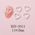 Macro shot of silver heart nail art charms with white zircons on a pink surface - Premium Pave Heart (A014) / 10 Pieces Pack / Silver