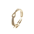 Goldener geometrischer Knotenring mit funkelnden Zirkonia-Steinen und verstellbarer Schiene - Einstellbar Offen / Verflochtener Knotenstil / Gold