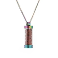 Detailed macro view of an openable rainbow glass vial pendant filled with red gemstones - Red Jasper Crushed Stones