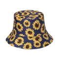 Close-up of sunflower print detail on a navy blue cotton reversible bucket hat - 58cm / Navy Blue