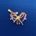 Pink heart crystal pendant with golden bow and pearl accents on deep blue background - Pink Heart Bow Pearl Style (729)
