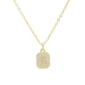 Detailed macro of golden square letter T pendant necklace with cubic zirconia micro-pave - Necklace T