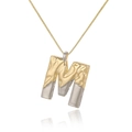 Detail of two-tone capital M letter pendant with hammered gold and smooth silver finish - Letter M