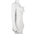 Detail of white waffle knit dress featuring lace-up cutout and split sleeve cuffs - L / White
