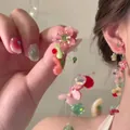 Detail of pink acrylic flower earrings with colorful bead fringe on a model - 6# Silver Earring Post - Multicolor