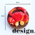Realistic 6cm red crab resin fridge magnet ornament in a brown woven basket prop - Crab