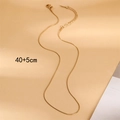 Detail of gold snake chain necklace with lobster clasp and adjustable 40+5cm length - Snake Chain (40+5cm) / Gold