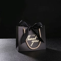Elegant matte black wedding favor bag with gold Thank You text and a satin bow - 14x6x12cm / Black Bag + Black Ribbon
