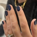 Macro shot of navy blue glossy artificial nails on hand with a chic gold necklace - Glossy Square / Navy Blue (CW276)