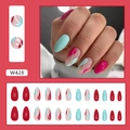 Stylish almond shaped press-on nails featuring a vibrant pink and blue wave pattern - Mandarin Duck Jump (W428)