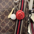 Baseball keychain set with mini wood bat, ball, and red glove on a brown handbag strap - 2CM Short Bat White Ball Red Glove