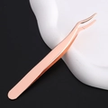 Detail view of professional rose gold curved tweezers for eyelash extensions in high quality - Rose Gold