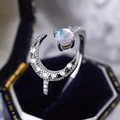 Exquisite moon ring featuring moonstone and zircons on deep blue velvet jewelry box - Adjustable Open / White Gold