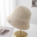 Minimalist beige knitted bucket hat for women with geometric texture and small metal logo - M(56-58cm) / Off White