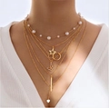 Layered gold necklace featuring faux pearls, stars, butterfly charms and heart pendant - Gold Five Layer Star Butterfly Heart Pearl