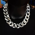 High-shine silver-finish chunky Cuban link chain necklace displayed on a black neck bust - 50cm Length / Silver