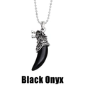 Detail of vintage silver wolf head necklace with a sharp black onyx wolf tooth pendant - Black Onyx