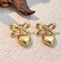 Orecchini a fiocco e cuore 3D in acciaio inossidabile placcato oro 18K su sabbia bianca - Ciondolo Fiocco Cuore (Oro) / Oro