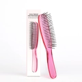 Translucent pink scalp massage brush with ergonomic handle and white retail packaging - Large (21.7cm) Boxed / Pink