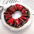 Detail of red tartan Christmas scrunchie with white faux fur trim and snowflake pattern - Small Snowflake Red