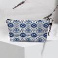 Detail of waterproof Evil Eye makeup bag with canvas texture and zipper closure - Blue White Greek Evil Eye