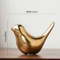 Golden ceramic bird ornament with reflective finish, 11cm width and 9cm height decor - Large / Gold