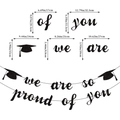 Glittery black graduation banner showing detailed dimensions of the text and mortarboard icons - Proud Of You Banner / Black
