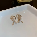 Golden ribbon-shaped stud earrings with white pearls and sparkling rhinestones - Silver Needle Tassel Style (15)