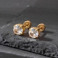 Macro detail of 5mm round zircon stud earring with gold-plated four-prong setting - 5mm / Gold