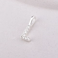 925 sterling silver letter L pendant with sparkling stones on grey background - L / Silver