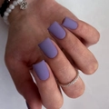 Short square matte purple press on nails shown on hand with elegant accessories - Matte Purple (JP3186)