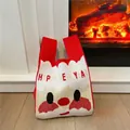 Christmas themed knitted tote bag with Santa Claus design and Happy New Year text - Santa Claus / Red Santa Claus