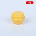Single 5g yellow mushroom cosmetic cream jar with screw lid on white background - Yellow