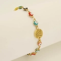 Golden Evil Eye bracelet with colorful beads and letter V charm on a display stand - Letter V
