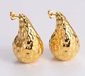 Polished golden teardrop earrings with hammered texture finish for women - Amleh021