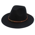 Detail of black felt fedora hat featuring brown braided band and bronze skull ornament - Black