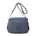 Waterproof mist blue nylon shoulder bag with adjustable strap and multiple zipper pockets - Foggy Blue