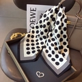 Chic black and white polka dot silk scarf with a heart brooch and striped border - Dots and Lines