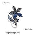 Spilla fiore elegante con cristalli blu scuro e finitura metallica in argento - Argento