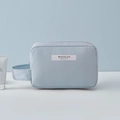 Light blue memory cloth makeup bag with top handle and MAKEUP BEAUTY text print - Light Blue Small