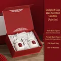 Wedding gift box with male and female sculpture candles in red festive packaging - Cocoa Liqueur + Ebony Engagement Edition