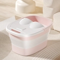 Pink and white foldable foot bath tub with massage lid on a cozy plush rug - Pink (With Lid & Handle)