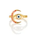 Detailed macro of gold crescent moon ring with red enamel and blue evil eye charm - Zj135