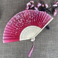 Classic folding fan with red gradient silk, cherry blossoms, and pink tassel detail - No.39 Red Gradient Cherry Blossom