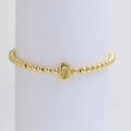 Polished 18k gold beaded elastic bracelet featuring a minimalist letter D charm - Gold D
