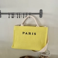 Yellow woven straw tote bag with Paris text and cream shoulder strap variant - Large Yellow