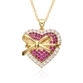 Golden heart necklace featuring a pink zircon center and delicate gold bow accent - Bowknot Heart Style (h149)